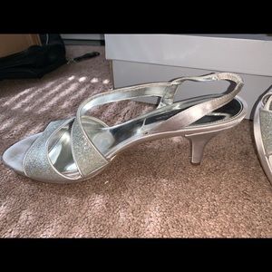 Silver open toed shoe